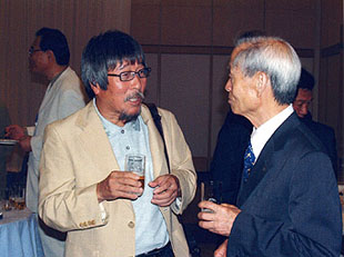 岡 千秋氏